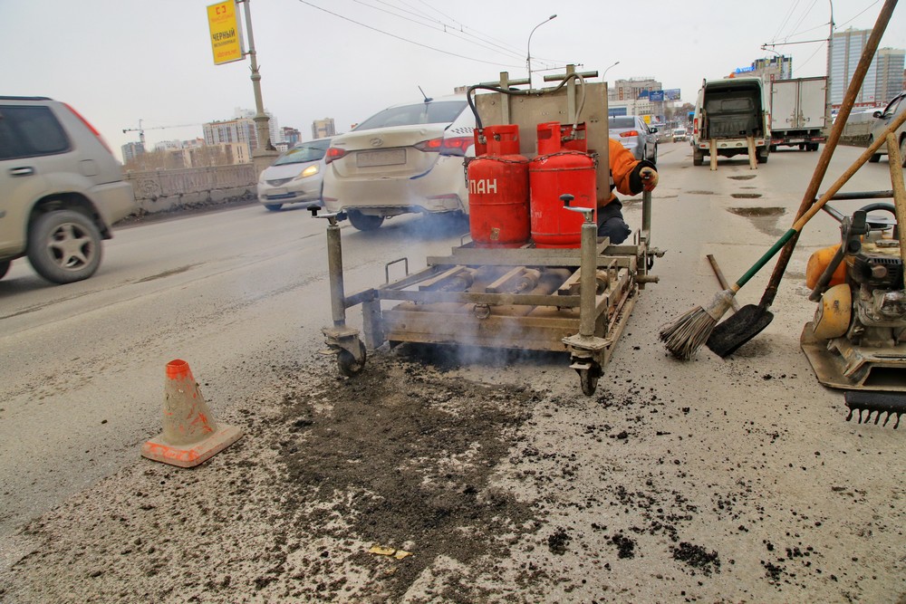 Ремонт дороги на Коммунальном мосту