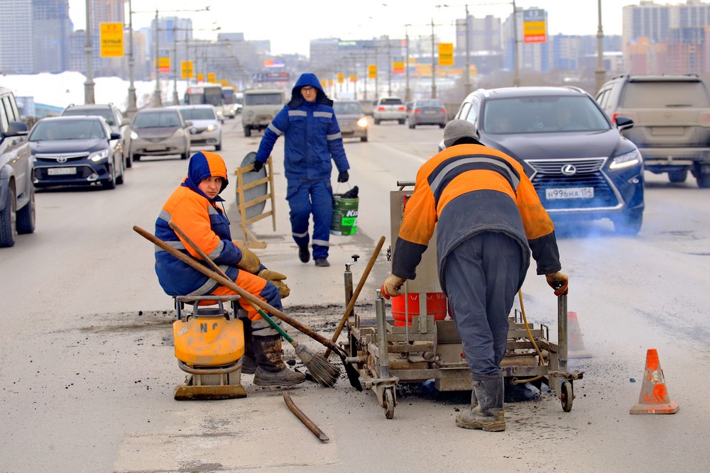 Ремонт дороги на Коммунальном мосту