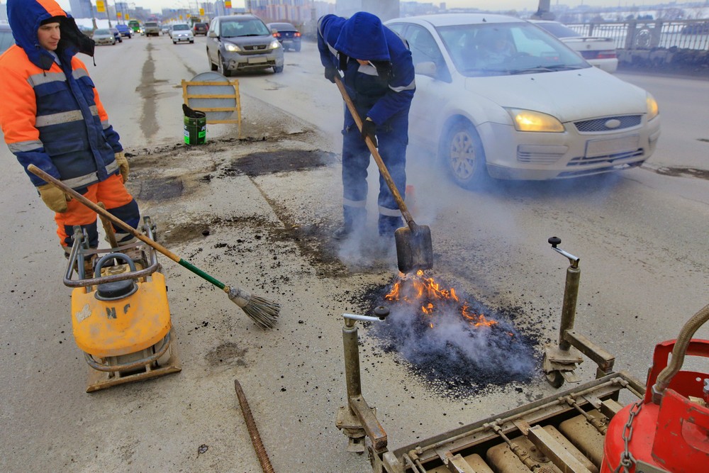 Ремонт дороги на Коммунальном мосту