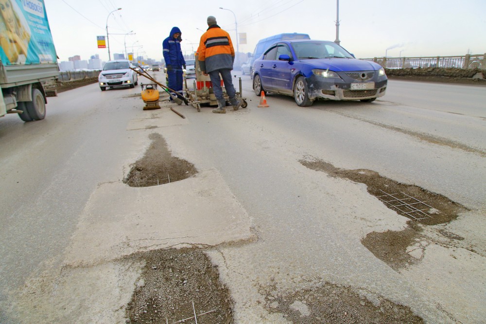Ремонт дороги на Коммунальном мосту