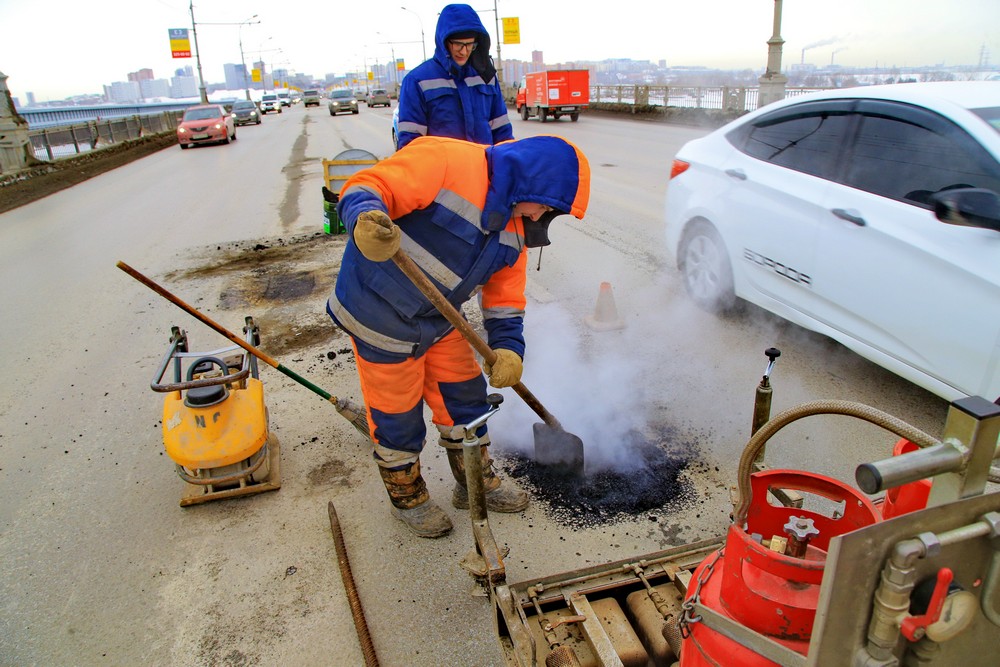Ремонт дороги на Коммунальном мосту
