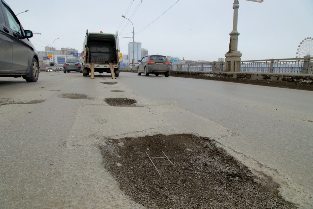 Ремонт дороги на Коммунальном мосту