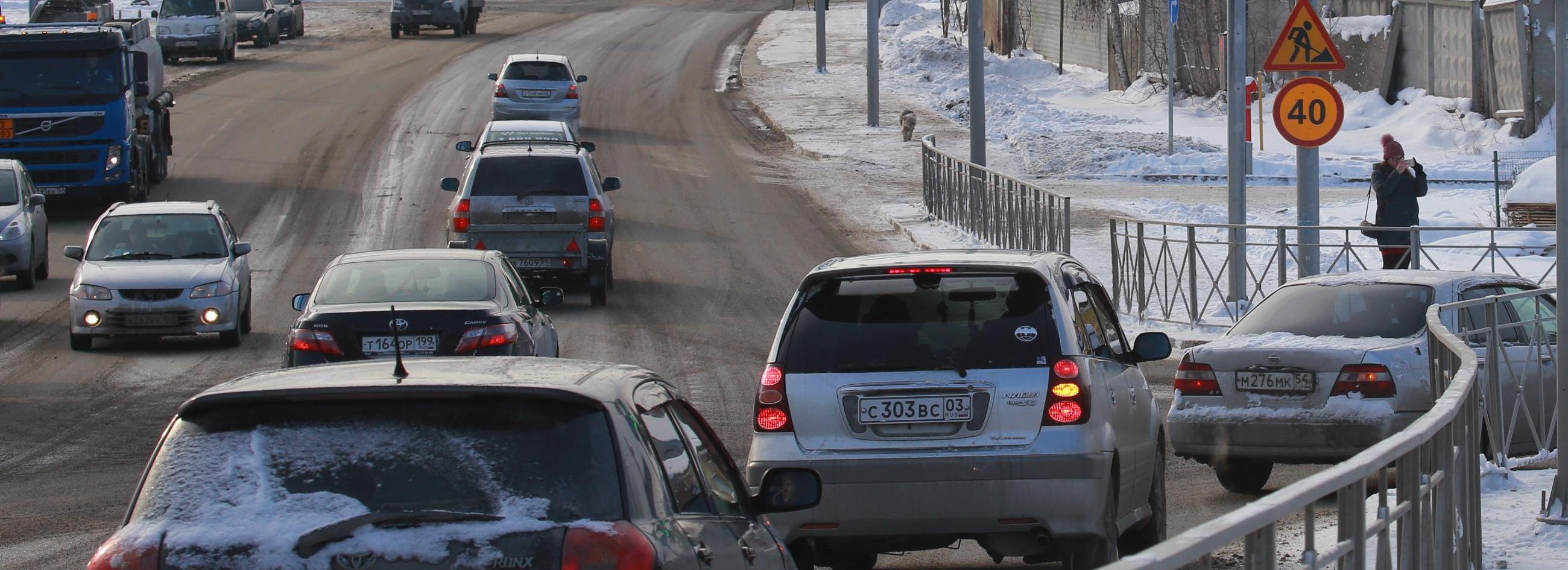 Поздно уложенный асфальт в Новосибирске тщательно проверят