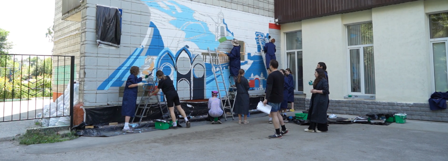 Серую стену на Никитина украсит мурал с символами Новосибирска