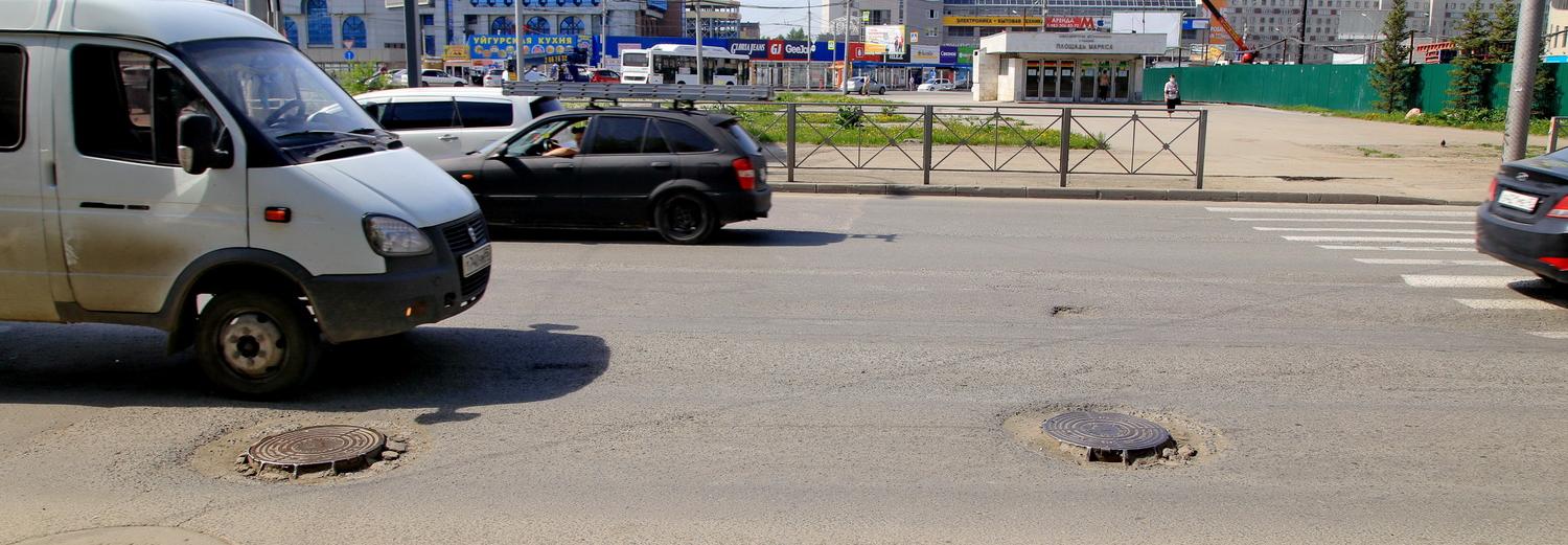 20 сантиметров: кто отвечает за ямы вокруг люков на дорогах Новосибирска