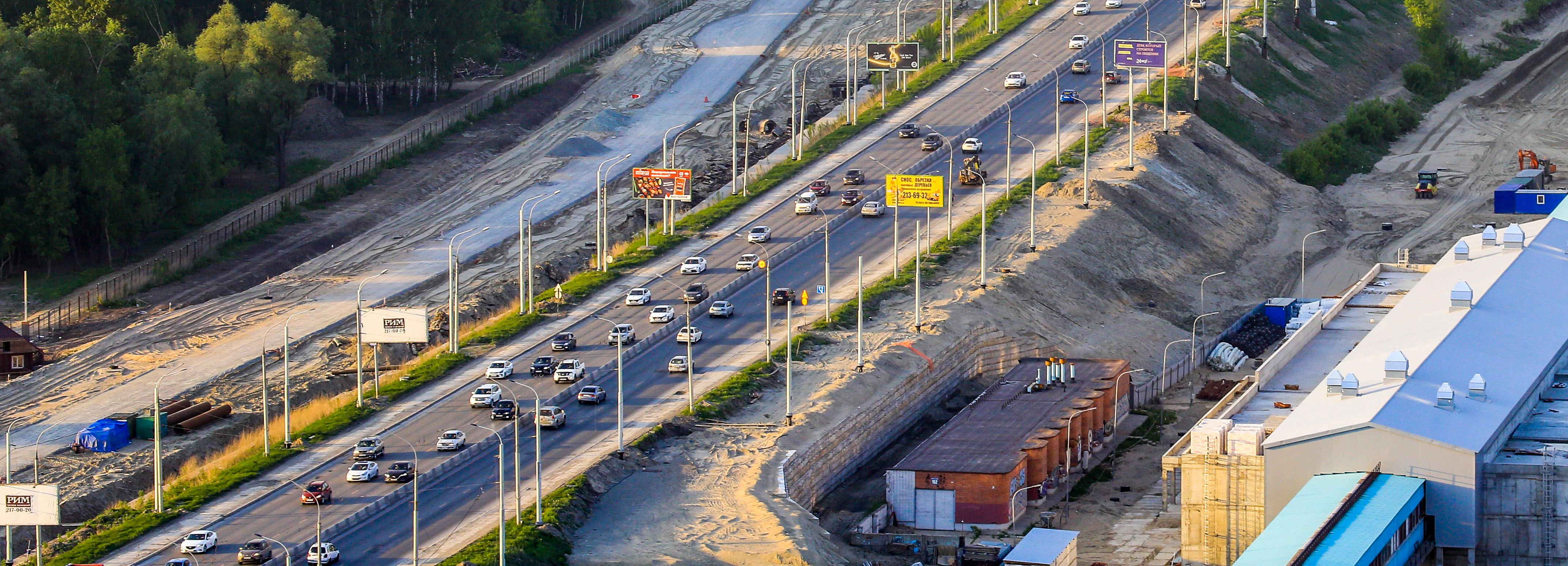 Новый асфальт на Октябрьском мосту уложили за четверо суток