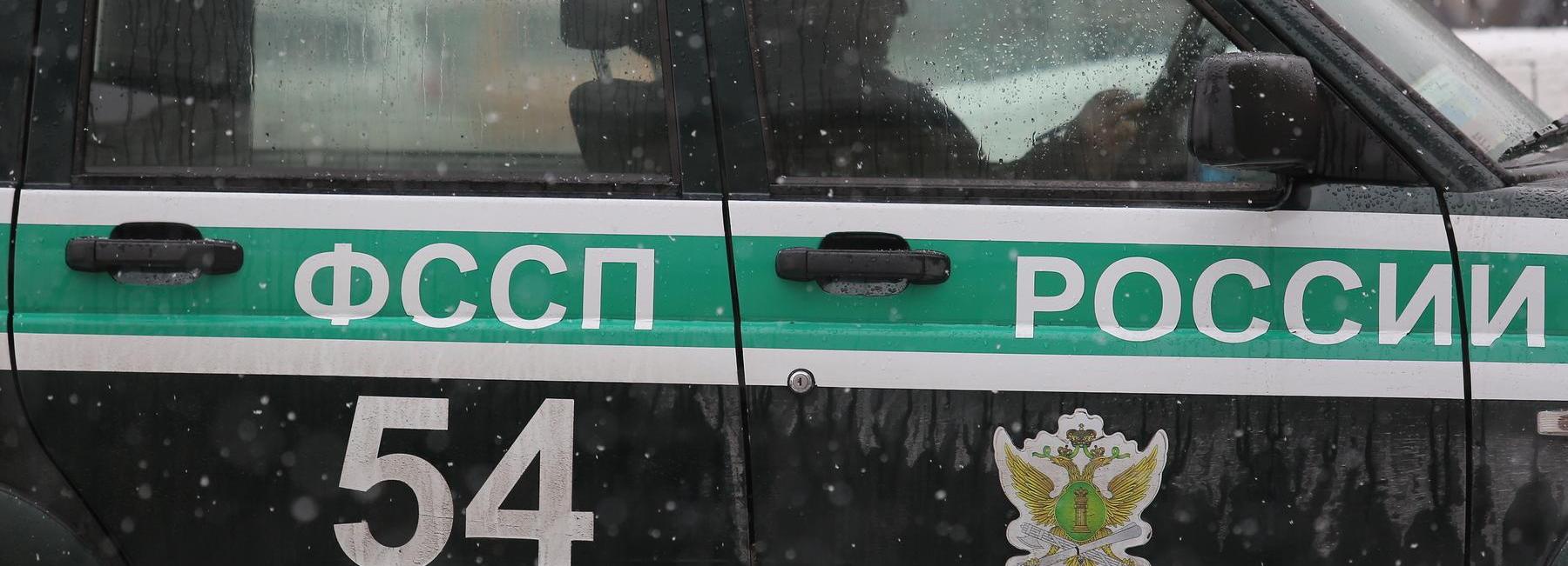 На парковке ТРЦ в Новосибирске арестовали Audi за миллионный долг