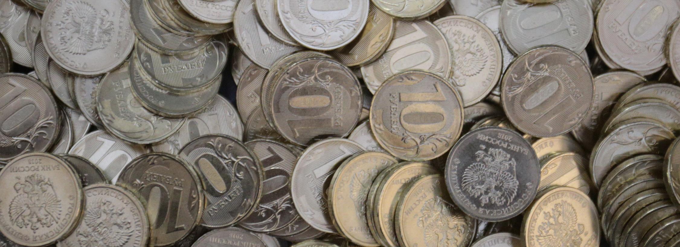 Фальшивую пятирублёвую монету обнаружили в новосибирском банке