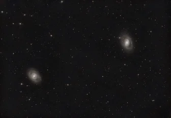 Сразу две спиральные галактики снял новосибирский астрофотограф