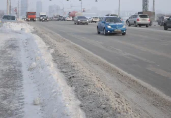 После дождя и снега ТУАД обеспечило проезд по новосибирским трассам