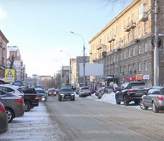 Опасную снежную колею убрали почти на всех дорогах Новосибирска