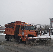 Город борется со снегом: фото с улиц Новосибирска 12 ноября