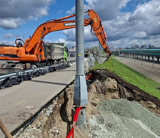 Дамбу Октябрьского моста восстановили после разрушительного ливня