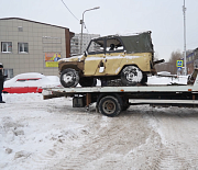 Внезапно возникший у дома на ГБШ бесхозный УАЗик увезли на утилизацию