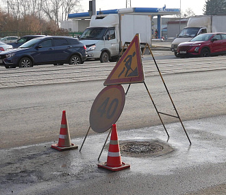 Проспект Дзержинского закатали в новый асфальт после ремонта ливнёвки