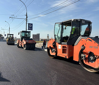 На проезжей части Димитровского моста закончили укладку асфальта