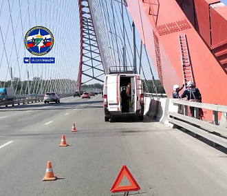 Спасатели спугнули сидящего на арке Бугринского моста новосибирца