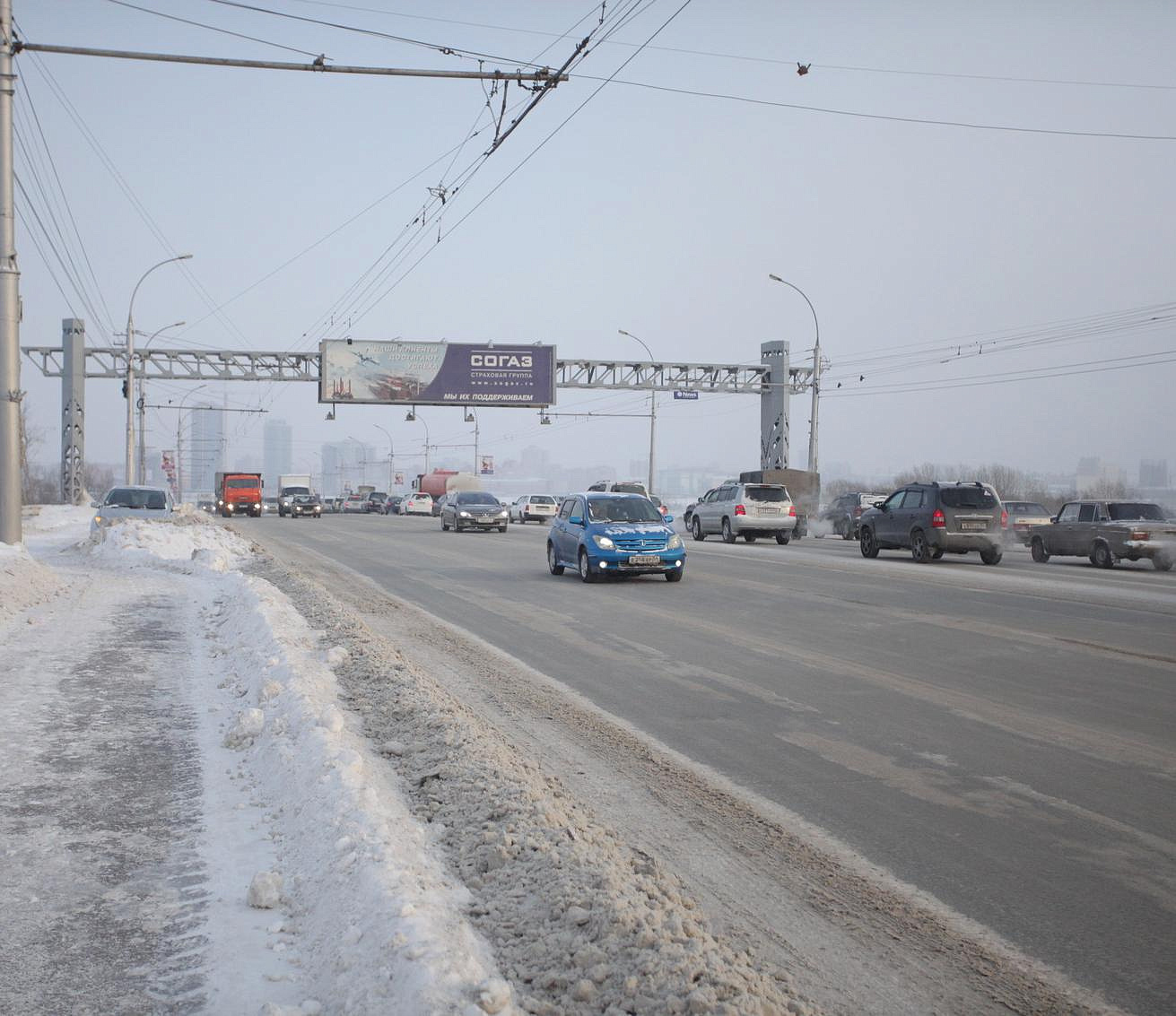После дождя и снега ТУАД обеспечило проезд по новосибирским трассам