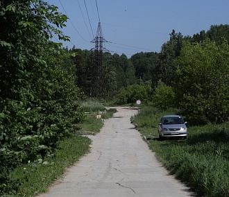 Разбитую дорогу у Ботсада СО РАН отремонтируют за счёт мэрии
