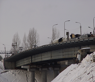 Отремонтируют мост через реку Издревая, на которой хотели строить полигон