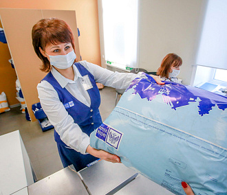 Открытка в 120 кг: новосибирская почта похвасталась рекордами